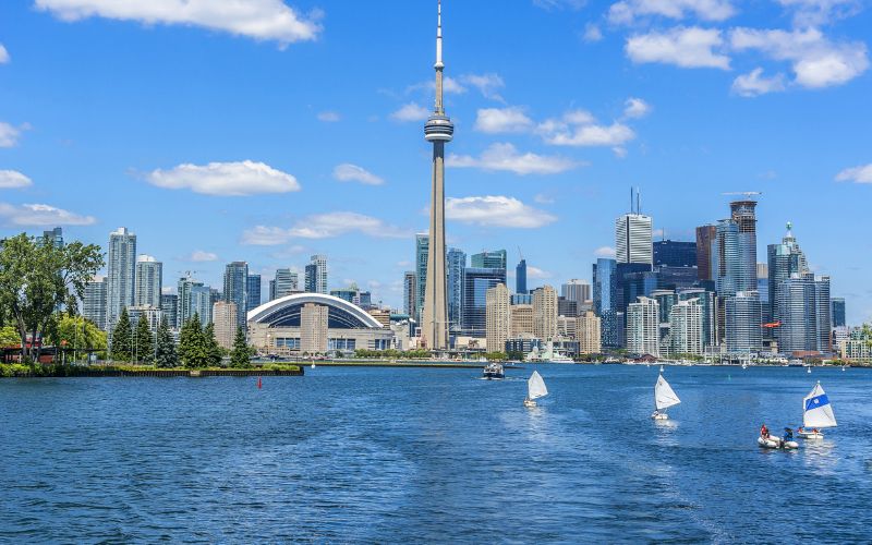 Toronto's skyline with CN Tower over lake